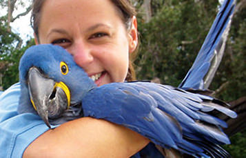 aviculturist with macaw